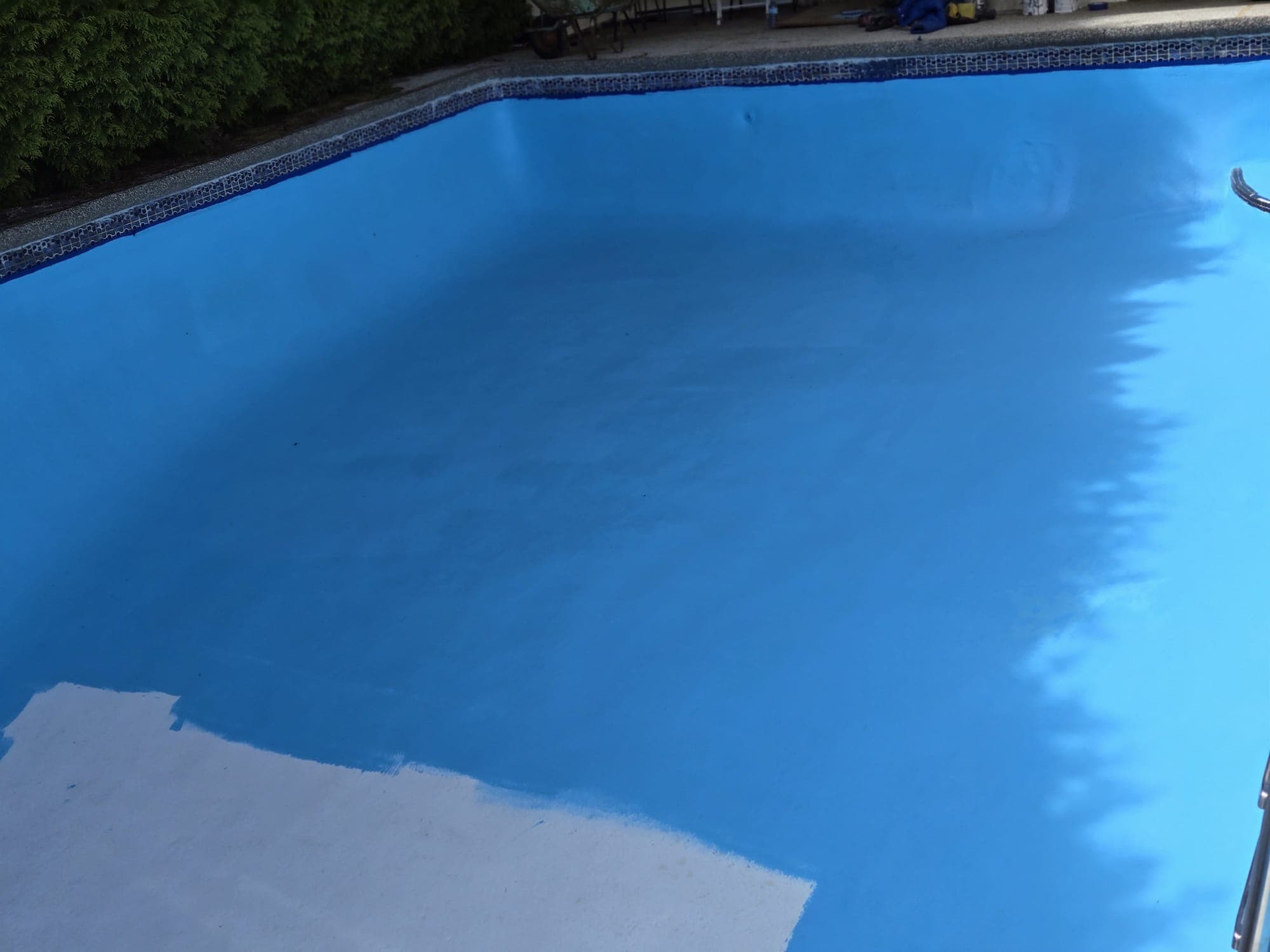 Exterior painting in progress — prep and masking