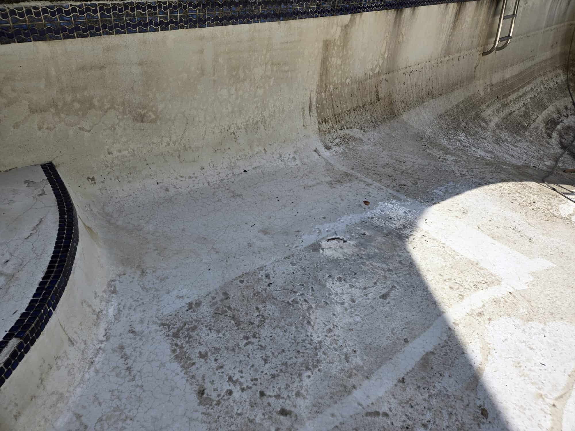 Exterior stucco before — weathering and staining