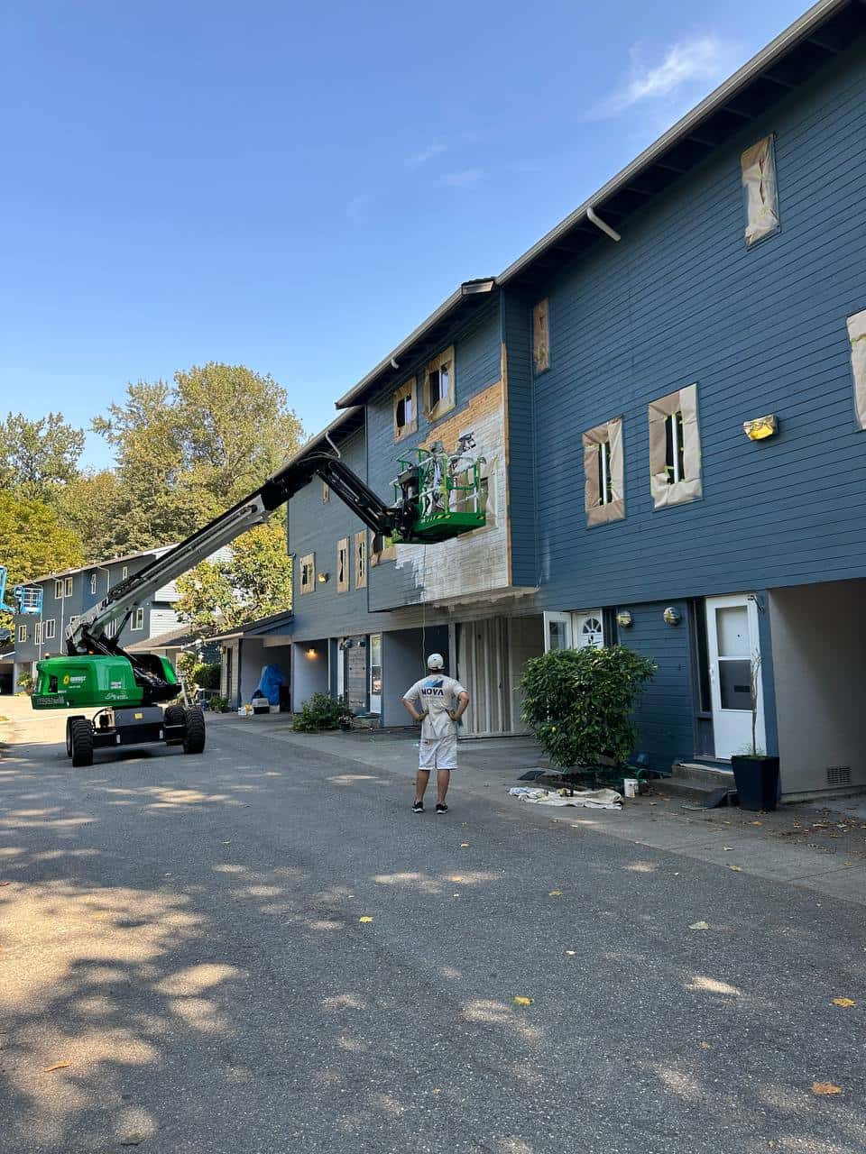 Fireplace and feature wall after — deep blue professional finish
